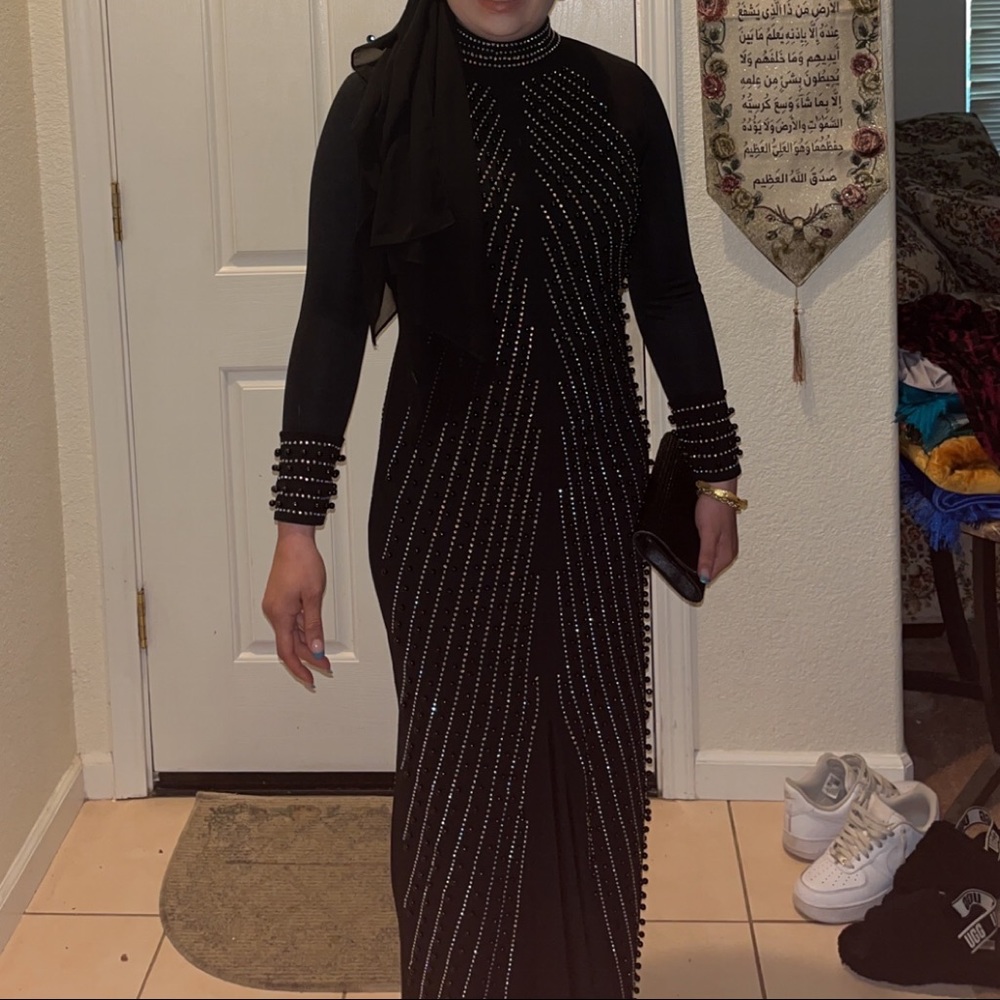 A long black beadwork mermaid cut
